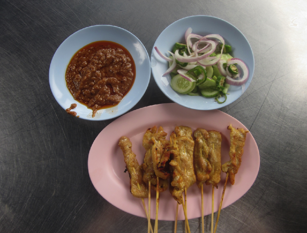 Pork satay in Bangkok, Thailand - photo by Chris Wotton