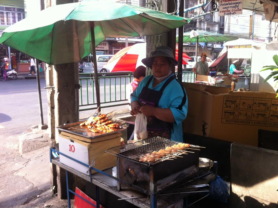 Moo ping grilled pork skewer stall in Bangkok, Thailand - photo by Chris Wotton