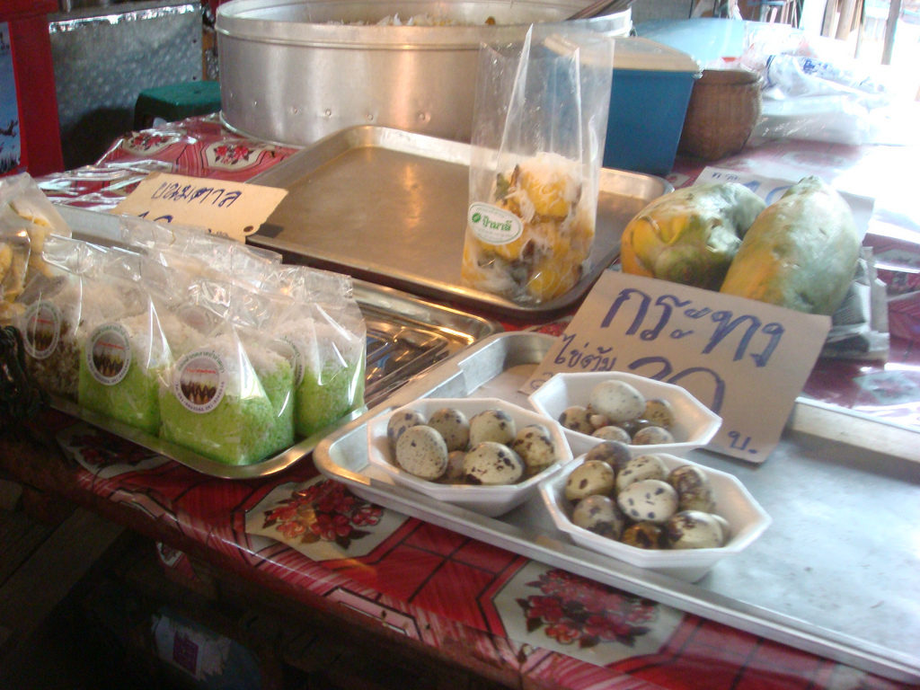 Snacks at Lamphaya floating market in Nakhon Pathom, near, Bangkok, Thailand - photo by sugree