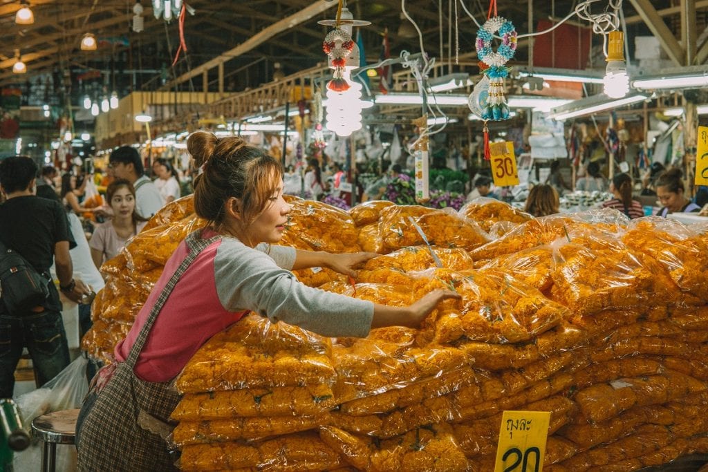 Vendor selling marigolds in the Bangkok Flower Market