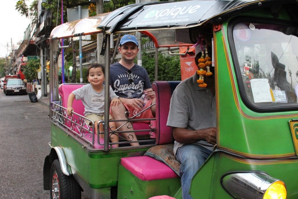 Family enjoying tuk tuk ride