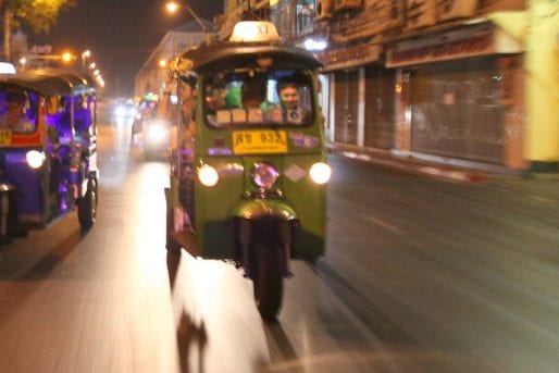 Tuk Tuks driving at night