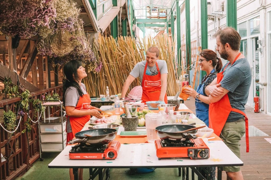 Guests enjoying Thai Cooking Class at The Market Experience