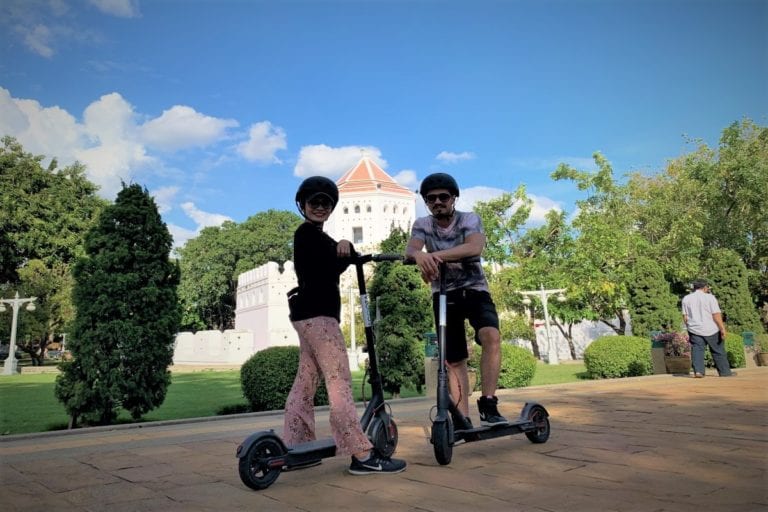 eScooter riders by Phra Sumen Fort in Rattanakosin (Bangkok)