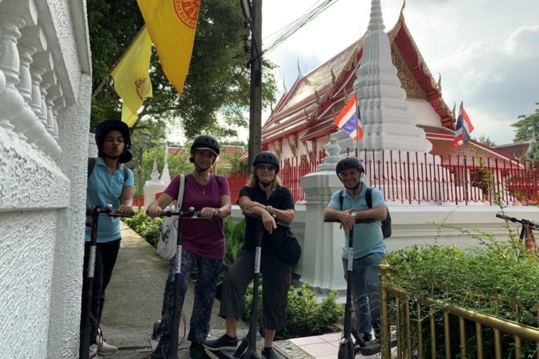 eScooter Tour visiting a local temple