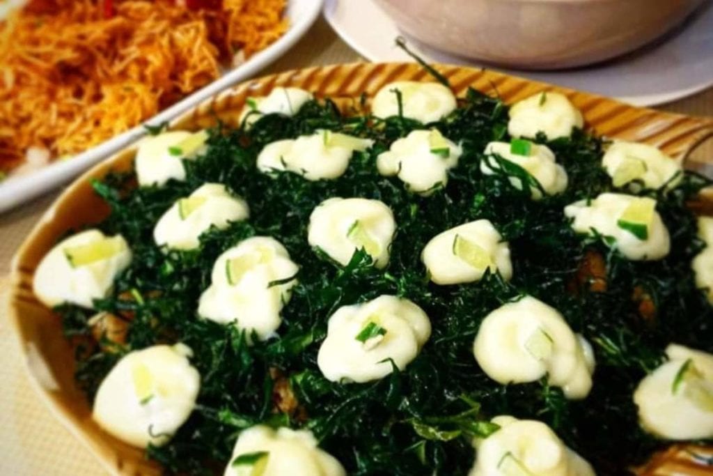 Deep-fried seabass with crispy kale and salad dressing at Poj Spa Kar
